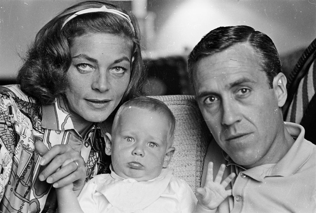 With Jason Robards and their son<br/>